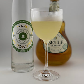 Pear and Cardamon Sidecare Cocktail next to Marc de Downton