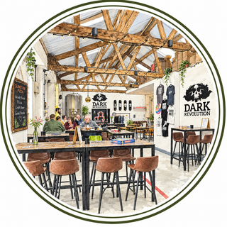 A circular interior photo of a rustic bar or restaurant space with exposed wooden ceiling beams, high tables, brown upholstered stools, and visible 'DARK REVOLUTION' branding on the walls.