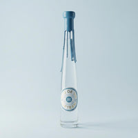 Eau de Vie de Fifteen, on a light blue background. Grape Brandy