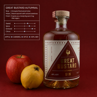 Bottle of Great Bustard Autumnal Gin with apples on a red background